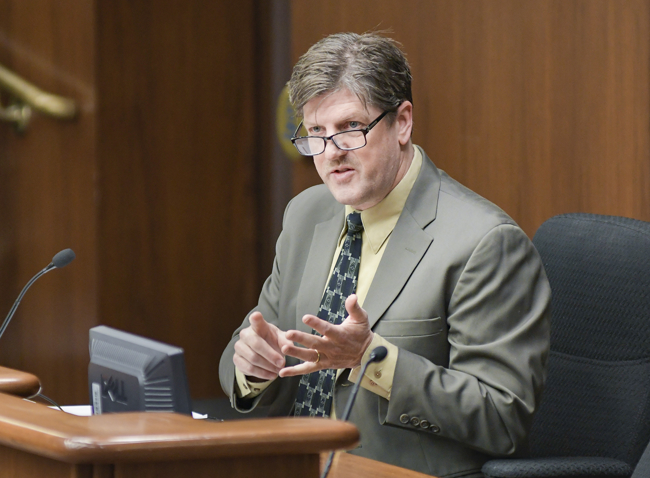 Lyon County Environmental Administrator Roger Schroeder testifies before the House environment and natural resources committee April 11 in support of a bill that would allow county interim permitting of demolition landfills. Photo by Andrew VonBank